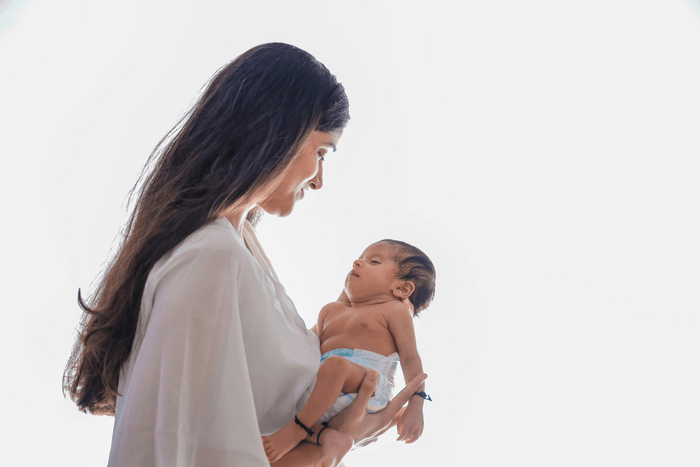 Mother looking at baby